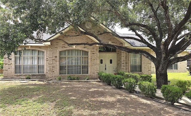 1107 Harbor Ln, La Joya, TX 78560 - view of front of property featuring brick siding