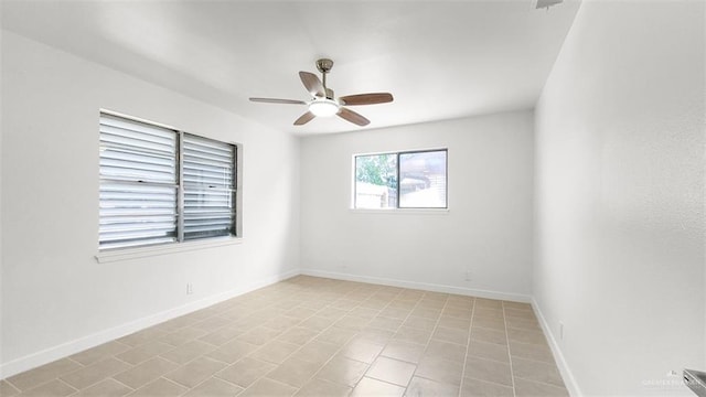 spare room featuring ceiling fan