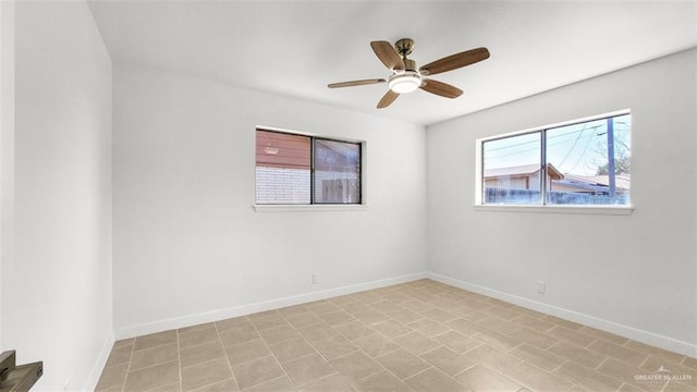 unfurnished room featuring ceiling fan