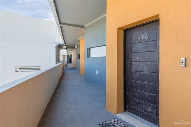 813 Travis St Unit 416, Mission, TX 78572 - doorway to property featuring stucco siding