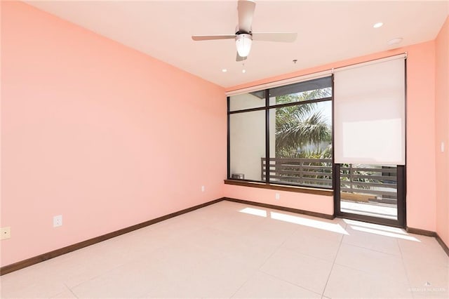 813 Travis St Unit 416, Mission, TX 78572 - empty room featuring recessed lighting, baseboards, a ceiling fan, and light tile patterned floors
