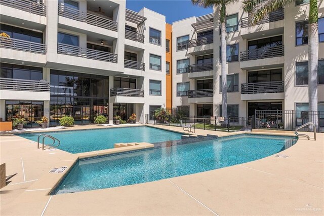 813 Travis St Unit 416, Mission, TX 78572 - pool with fence