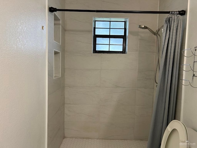 206 Justice Ln, San Juan, TX 78589 - bathroom with a stall shower and toilet