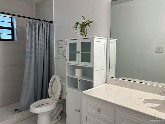 206 Justice Ln, San Juan, TX 78589 - full bathroom with vanity, a tile shower, and tile patterned flooring