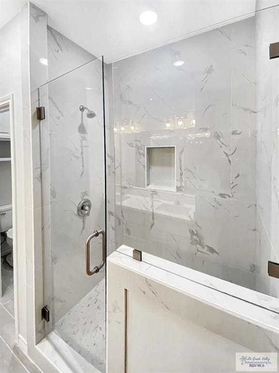 505 Independence Ave, San Benito, TX 78586 - full bathroom with a marble finish shower and recessed lighting