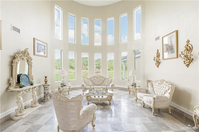 interior space with a towering ceiling