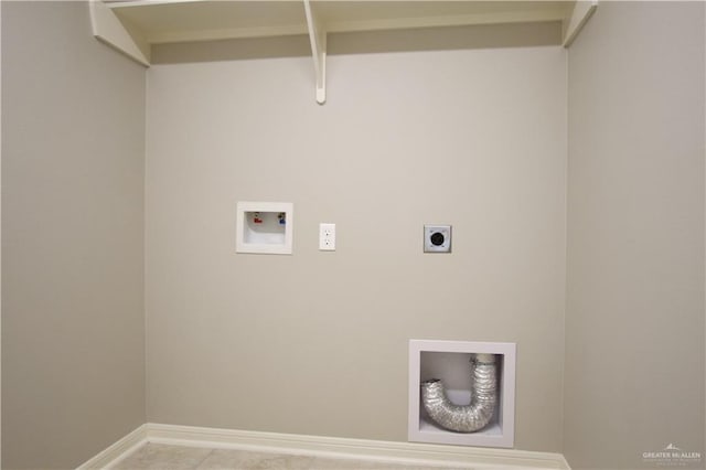 clothes washing area featuring hookup for an electric dryer, hookup for a washing machine, and light tile patterned floors