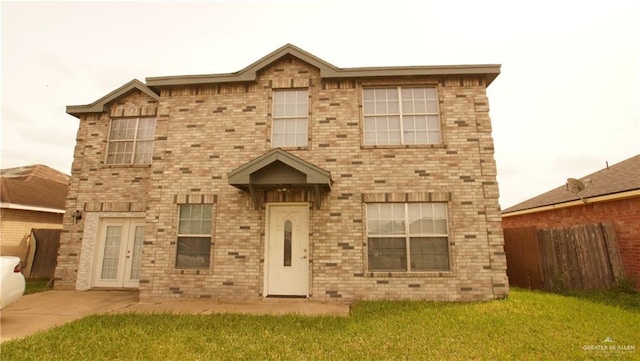 view of front facade featuring a front yard