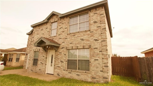 view of front of property featuring a patio