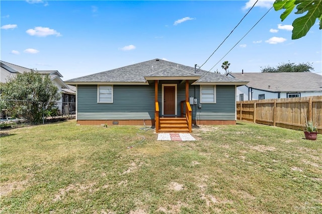1018 N Keralum Ave, Mission, TX 78572 - back of house with roof with shingles