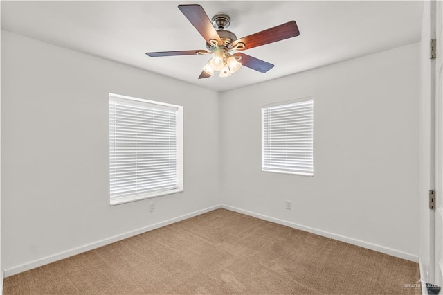 1018 N Keralum Ave, Mission, TX 78572 - empty room with light carpet, baseboards, and ceiling fan