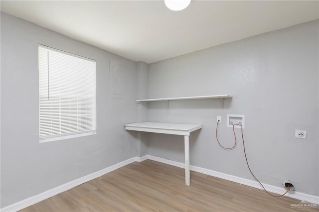 7201 S San Marcos St, Pharr, TX 78577 - laundry room featuring washer hookup, light wood-type flooring, baseboards, and hookup for an electric dryer