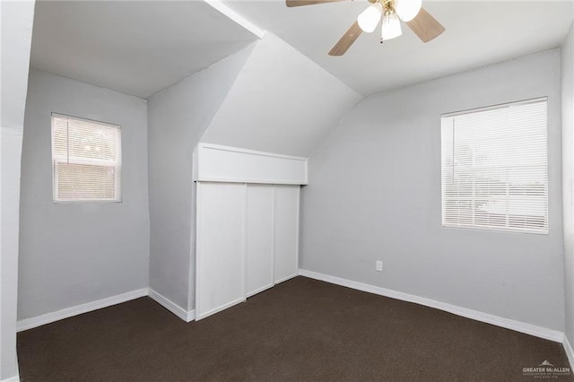 7201 S San Marcos St, Pharr, TX 78577 - additional living space with vaulted ceiling, ceiling fan, dark colored carpet, and baseboards