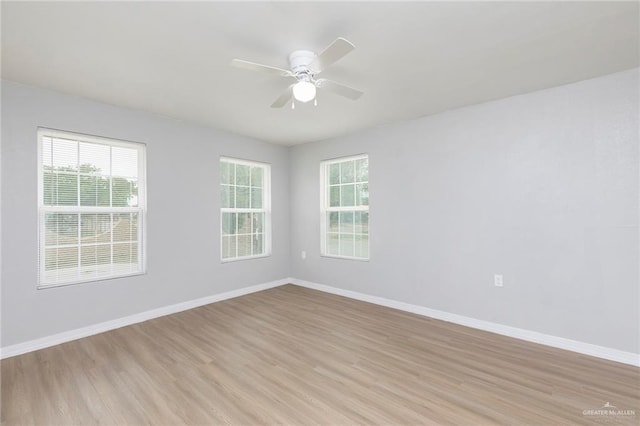 7201 S San Marcos St, Pharr, TX 78577 - empty room with light wood finished floors, baseboards, and ceiling fan
