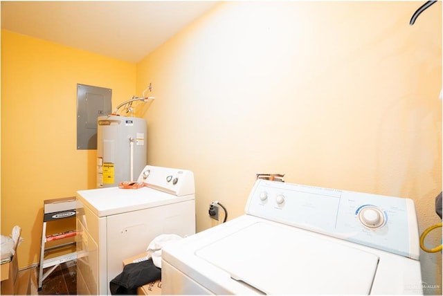 laundry room featuring washing machine and dryer, electric panel, and water heater