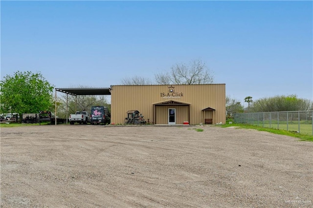 view of outdoor structure with a carport