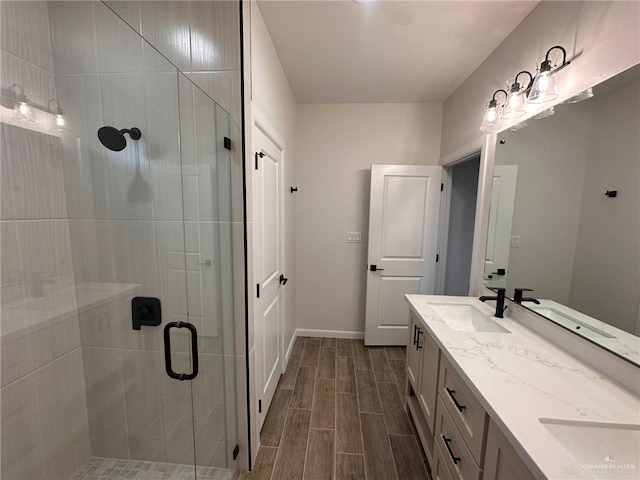 bathroom with vanity and walk in shower