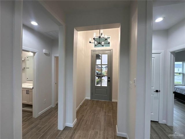 foyer with a notable chandelier