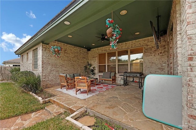 view of patio / terrace with a grill and ceiling fan