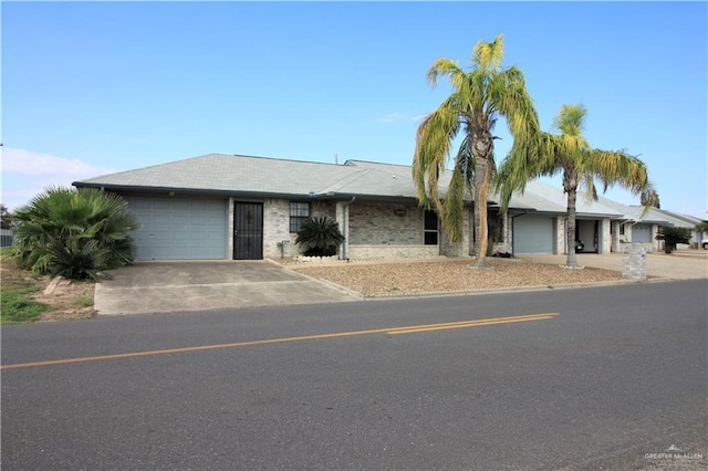 single story home featuring a garage