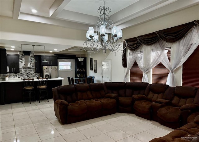 314 N 17th St, Hidalgo, TX 78557 - living room featuring light tile patterned flooring and a chandelier