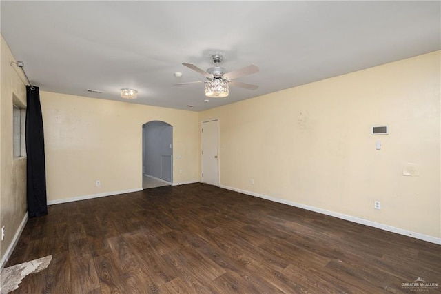 477 Serg Loop, Alamo, TX 78516 - unfurnished room featuring a ceiling fan, wood finished floors, arched walkways, baseboards, and visible vents