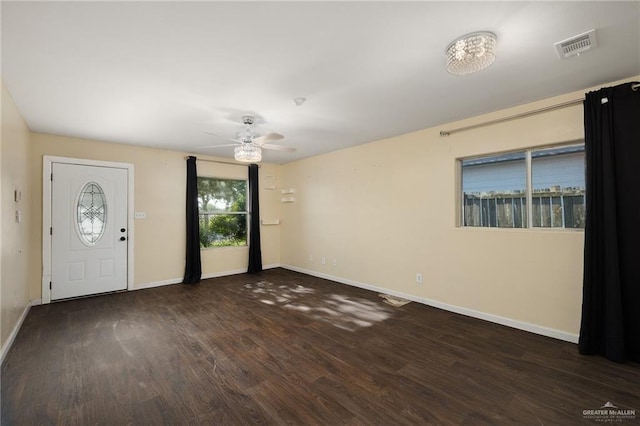 477 Serg Loop, Alamo, TX 78516 - interior space featuring visible vents, baseboards, a ceiling fan, and wood finished floors