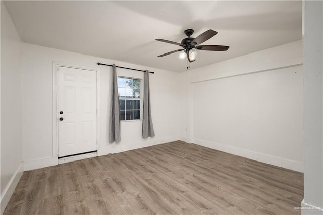 477 Serg Loop, Alamo, TX 78516 - spare room featuring wood finished floors, a ceiling fan, and baseboards