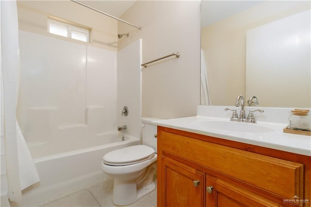 full bathroom featuring vanity, bathing tub / shower combination, and toilet