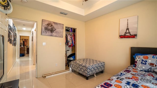 823 Sabrina Dr, Alamo, TX 78516 - bedroom featuring tile patterned flooring and a closet