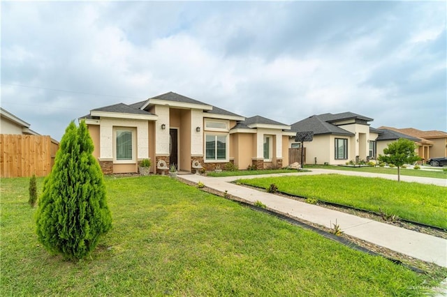 823 Sabrina Dr, Alamo, TX 78516 - prairie-style house with stucco siding and stone siding