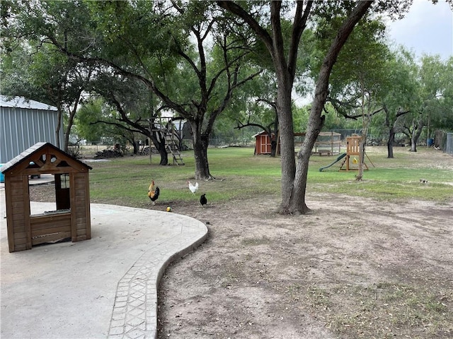 4308 Auburn Ave, Mcallen, TX 78504 - view of grassy yard with a shed
