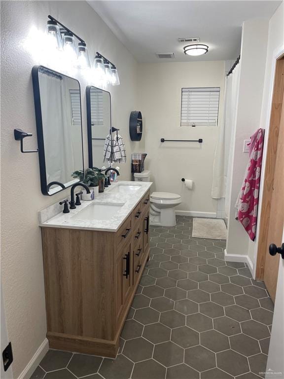 4308 Auburn Ave, Mcallen, TX 78504 - full bath with double vanity, tile patterned flooring, and curtained shower