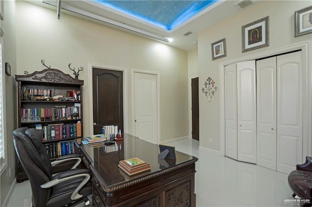 home office featuring light tile patterned floors