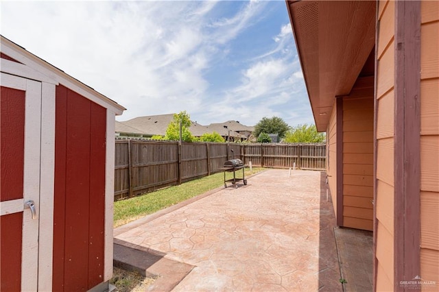 view of patio with a fenced backyard