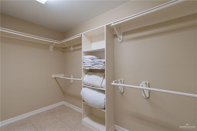 walk in closet featuring tile patterned floors