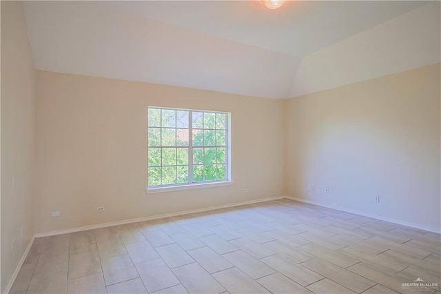 4612 Laurel Ave, Mcallen, TX 78501 - empty room with vaulted ceiling and baseboards