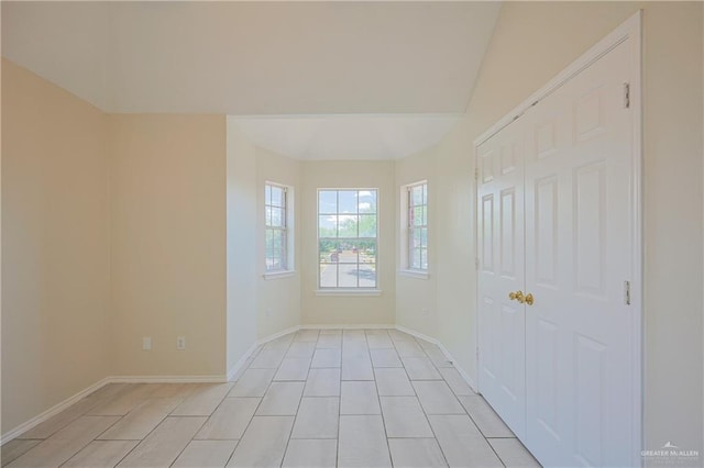 4612 Laurel Ave, Mcallen, TX 78501 - empty room with baseboards and light tile patterned floors