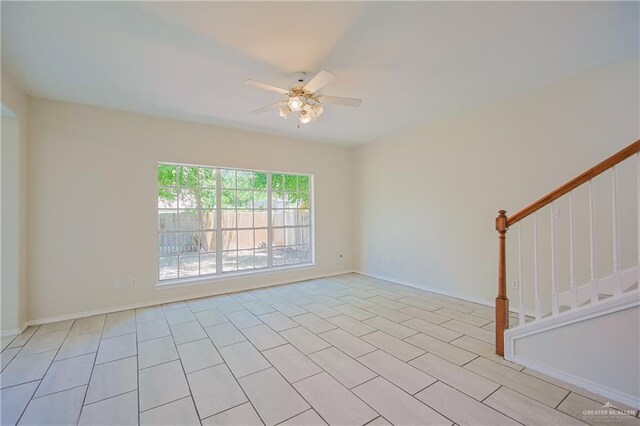 4612 Laurel Ave, Mcallen, TX 78501 - spare room featuring ceiling fan, stairway, and baseboards