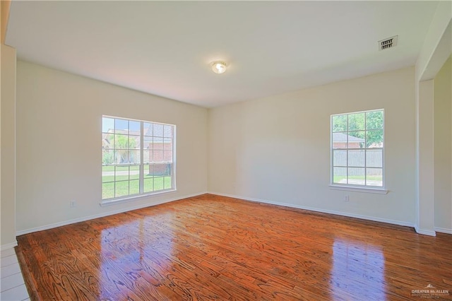 4612 Laurel Ave, Mcallen, TX 78501 - empty room with wood finished floors and baseboards