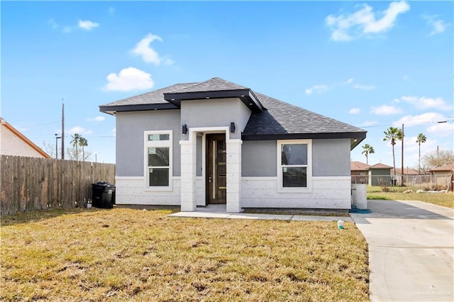 view of front of property with a front lawn