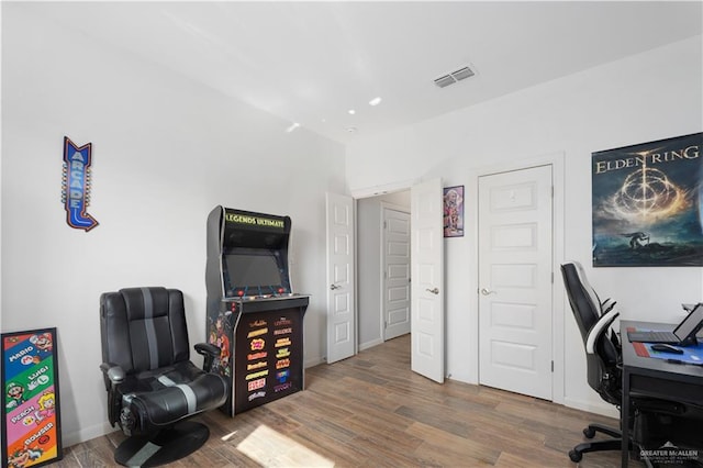 home office featuring hardwood / wood-style floors