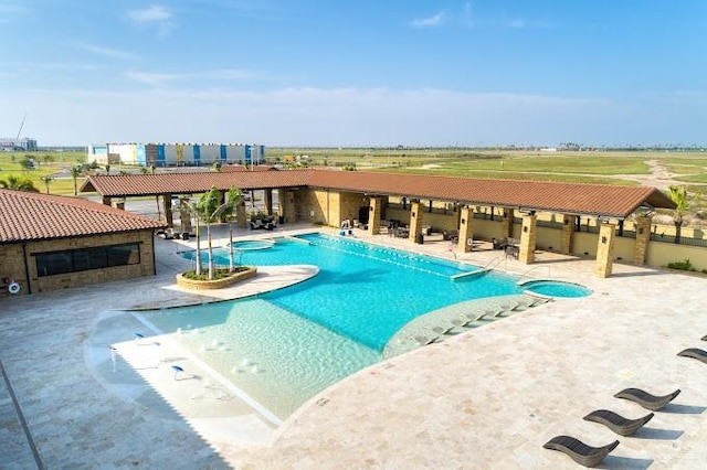 view of pool with a patio area