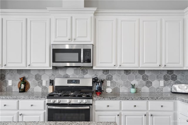 kitchen featuring white cabinets and stainless steel appliances