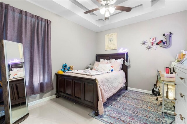 13500 35th St, Edinburg, TX 78541 - bedroom featuring a raised ceiling, baseboards, and ceiling fan