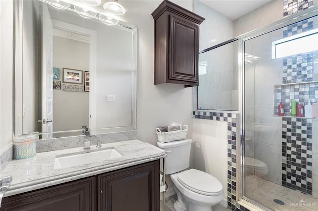 13500 35th St, Edinburg, TX 78541 - full bath with toilet, a stall shower, and vanity