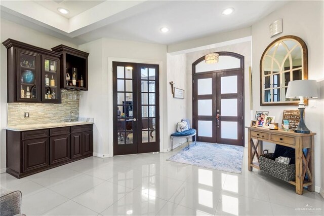 13500 35th St, Edinburg, TX 78541 - foyer featuring french doors, light tile patterned floors, baseboards, and recessed lighting