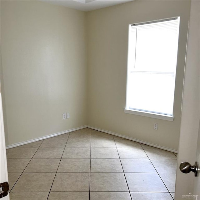 view of tiled spare room