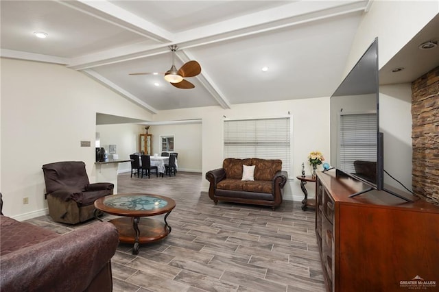 living room with ceiling fan, lofted ceiling with beams, and wood-type flooring