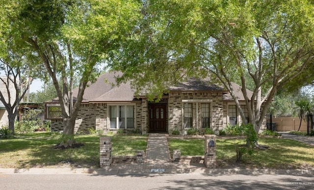 view of front of property with a front lawn